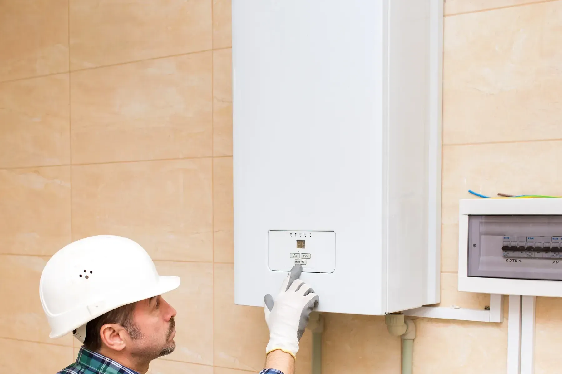 RPH engineer working on a hot water system